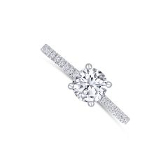14K White Gold Round 1.01CT Diamond, Color- GH, Clarity- SI2 SI3. With multiple Round 0.18ctw Diamonds along the band.
