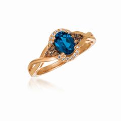 Le Vian Chocolatier® Ring featuring 3/4 cts. Deep Sea Blue Topaz™, 1/8 cts. Chocolate Diamonds® , 1/20 cts. Vanilla Diamonds®  set in 14K Strawberry Gold®
